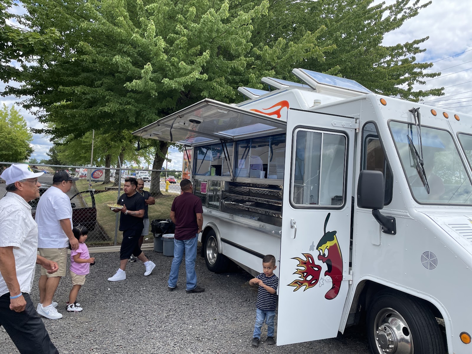 Open food truck at outdoor market